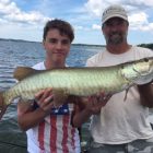kids with muskies 1 guide